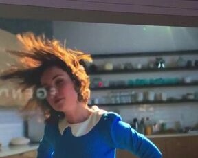 MIlana Vayntrub dancing in blue shirt