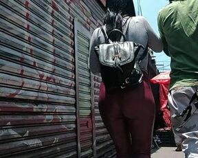 Cute ass in tight red shiny leggins.