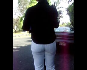 A mom in white pants