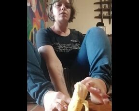 Peels a Banana with her Toes and Takes a Big Bite