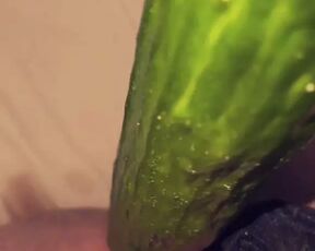 Swiss girl fucks herself with a cucumber