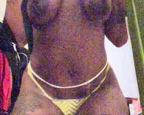 Horny ebony with big areolas teasing herself