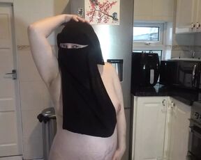 Dancing fully nude in Niqab