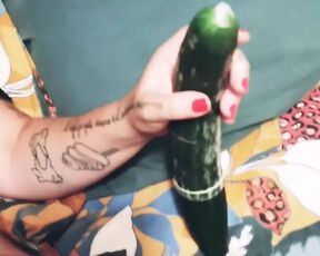 Wife with cucumbers