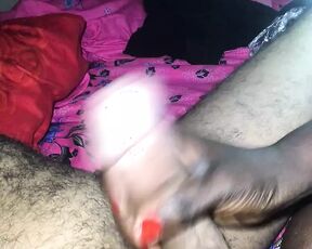 Nubian Bitch in a Handjob Play on a White Cock